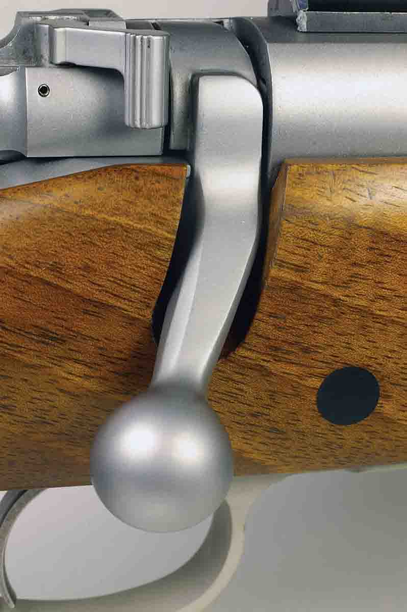 The bolt handle is slightly swept back and looks a lot like the bolt handle on old Winchester Model 70s.